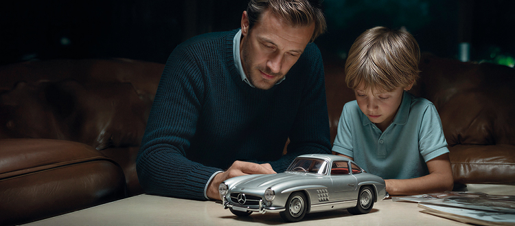 Vater und Sohn mit Modellauto