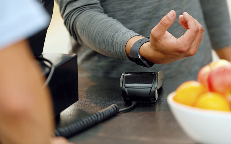 Bezahlen mit dem Handgelenk Bezahlen mit dem Handgelenk